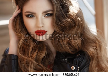 http://thumb7.shutterstock.com/display_pic_with_logo/2457938/635858621/stock-photo-fashion-outdoor-photo-of-gorgeous-long-hair-woman-in-elegant-red-dress-and-black-leather-jacket-635858621.jpg