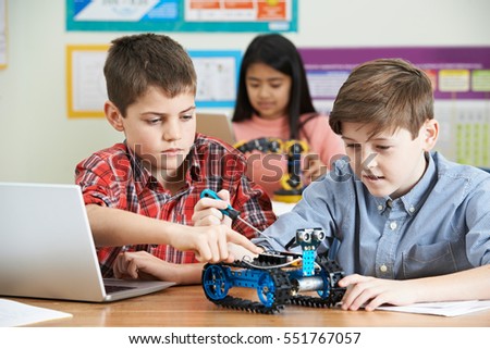 Pupils In Science Lesson Studying Robotics