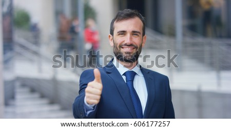 stock-photo-a-man-in-a-suit-looks-in-cam