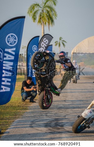 Ban Chang District RAYONG, THAILAND - November 18, 2017 : It is the show of motorcycle's Stuntman.