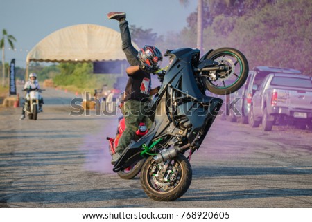 Ban Chang District RAYONG, THAILAND - November 18, 2017 : It is the show of motorcycle's Stuntman.