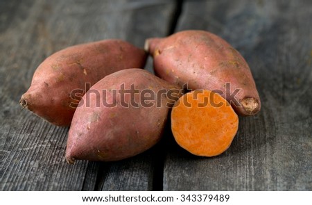 sweet poato on wooden surface