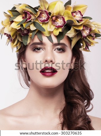 https://thumb7.shutterstock.com/display_pic_with_logo/2538943/303270635/stock-photo-beauty-girl-with-orchid-flowers-beautiful-model-woman-face-perfect-skin-professional-make-up-303270635.jpg