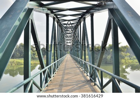 The old iron bridge in midday (Select focus)