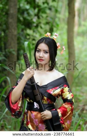 http://thumb7.shutterstock.com/display_pic_with_logo/2589682/238776661/stock-photo-portrait-asia-beautiful-japanese-kimono-woman-and-japanese-geisha-woman-with-japanese-sword-and-238776661.jpg