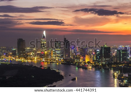 SAIGON, VIETNAM - DEC 20, 2014 : Impression landscape of Ho Chi Minh city at night , Saigon river flows through the city, this photo was taken at Sai Gon pearl building.