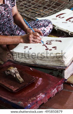 HA NOI, VIETNAM - JULY 25, 2015 - the woman, as artisans, folk, Dong Ho, Bac Ninh, Vietnam