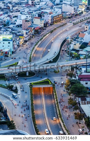 SAIGON, VIETNAM - DEC 23, 2016 : Impression landscape of Ho Chi Minh city at night , Saigon river flows through the city, this photo was taken at Sai Gon pearl building.