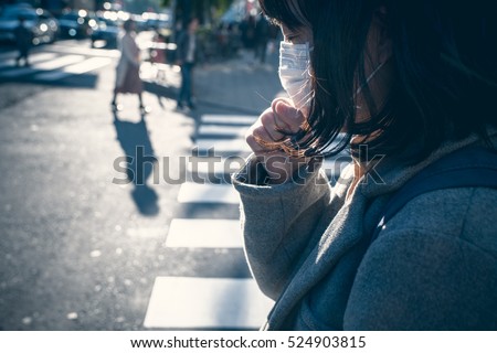 Woman coughing