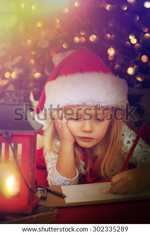 Little girl writes letter to Santa