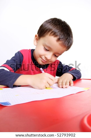 Five years old child writing, White background