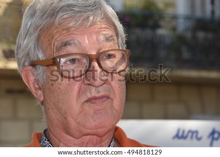 Marseille, France - October 06, 2016 : French cartoonist Batti Manfruelli at the 5th edition of the International festival of press and political cartoons at l'Estaque.