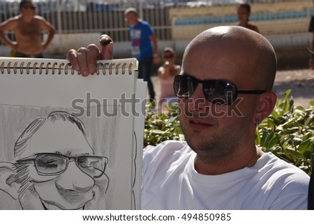 Marseille, France - October 06, 2016 : French cartoonist Djony Rubio at the 5th edition of the International festival of press and political cartoons at l'Estaque.
