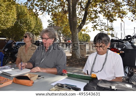 Marseille, France - October 06, 2016 : French cartoonists Jean-Michel Renault and Jean-Paul Vomorin at the 5th edition of the International festival of press and political cartoons at l'Estaque.