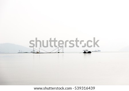 sunrise on thung nai lake , hoa binh , viet nam