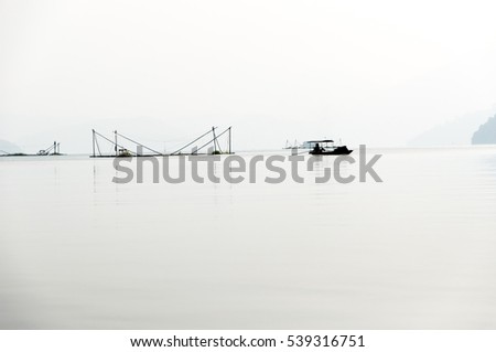 sunrise on thung nai lake , hoa binh , viet nam