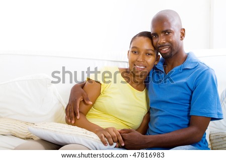 https://thumb7.shutterstock.com/display_pic_with_logo/270058/270058,1267435710,1/stock-photo-young-happy-african-american-couple-relaxing-at-home-on-sofa-47816983.jpg