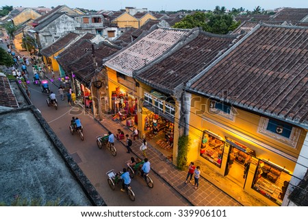 HOI AN, VIETNAM - CIRCA AUGUST 2015: People walking on the streets of old town Hoi An, Vietnam
