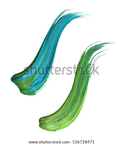 green stroke of the paint brush on white paper