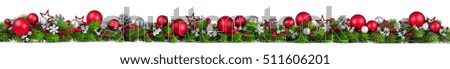 Extra wide Christmas border with fir branches, red and silver baubles, pine cones and other ornaments, isolated on white