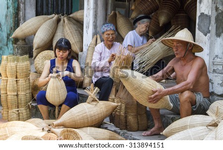 HUNGYEN, VIETNAM - JUNE 21 :Unidentified people weaving bamboo on June 21, 2015 in HungYen, Vietnam. Weaving this tools that used to catch fish is traditional occupation in Hung Yen province.