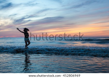 Thanh Hoa, Vietnam , Aug 13 2015 , group of friends splashing water in the sea at samson beach, Thanh Hoa. people and fun