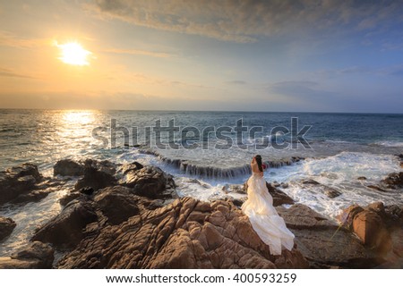 Hang Rai beach, Ninh Thuan province, Vietnam - March 27, 2016 : happy bride on the beach near the ocean at ecotourism at Hang Rai Vietnam, Phan Rang city, Ninh Thuan, coastal countryside, amazing