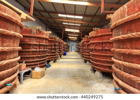 Phu Quoc island, Kien Giang province, Vietnam - May 02, 2016 : at factory fish sauce production facilities on Phu Quoc island by traditional fermented method of anchovies fermented brewed in large