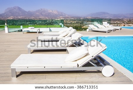 Pool Beds swimming pool area white sun beds stock photo 386713351 - shutterstock Pool Beds swimming pool area white sun beds stock photo 386713351 - shutterstock