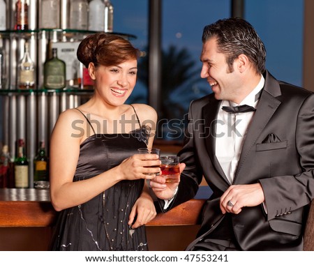 http://thumb7.shutterstock.com/display_pic_with_logo/277501/277501,1267267732,1/stock-photo-young-couple-at-bar-drinking-and-flirting-47553241.jpg