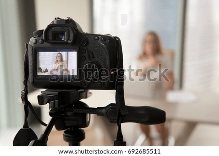 Professional digital equipment recording video blog of businesswoman, online business coach making presentation for website, filming popular vlog or master class for videoblog channel, focus on camera