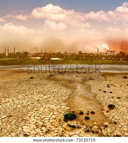 Industrial destruction. Smoke and smog from a manufacturing plant. Environmental pollution of the industrial city, smoking chimneys of factories.