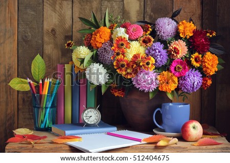 Bouquet and book. Back to school. September 1, Knowledge Day, Teacher's Day.
