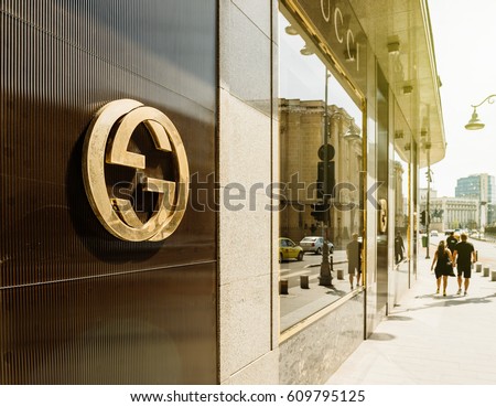 BUCHAREST, FRANCE - APR 1, 2016: Gucci sign logo on fashion store official boutique flagship store in Bucharest. Gucci is a luxury brand known for modern, Italian-crafted leather goods