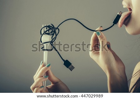 les éléments - Page 33 Stock-photo-female-mouth-with-sexy-lips-holding-with-finger-usb-flash-wire-cable-for-connection-and-white-447029989