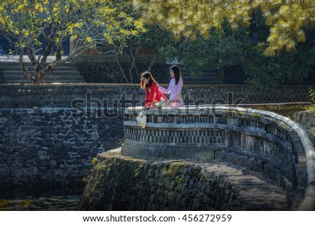 Ao dai is famous traditional costume for woman in VIetnam.Beautiful woman with vintage style ,Beautiful woman with Vietnam culture traditional,Hoi an,Life of Vietnamese