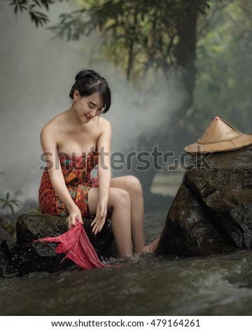 Thai women bathing | Thai Woman bathing in the river 