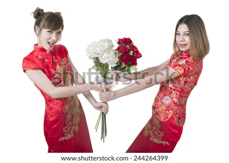 https://thumb7.shutterstock.com/display_pic_with_logo/2843329/244264399/stock-photo-happy-chinese-new-year-beautiful-young-asian-woman-with-flowers-244264399.jpg