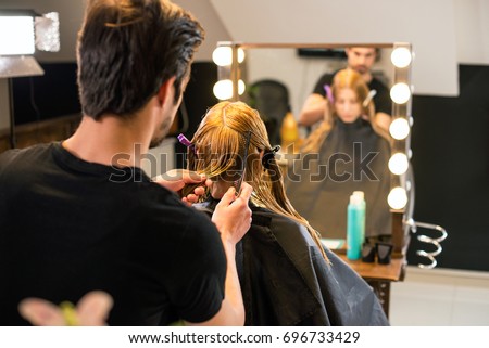 Hair dresser in action, creating new look