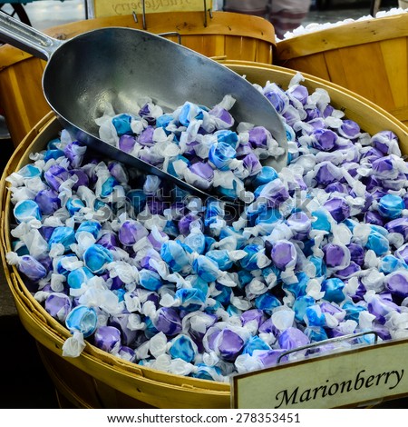 stock-photo-a-bushel-of-marionberry-taffy-candy-with-scoop-in-it-in-a-local-market-at-ellensburg-washington-us-278353451.jpg