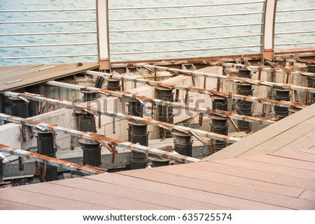 Remodel of timber boardwalk wooden walkway on shore of singapore sea slope adjustable Remodel of timber boardwalk wooden walkway on shore of singapore sea slope adjustable