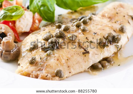 Tilapia fillet in white wine sauce with capers
