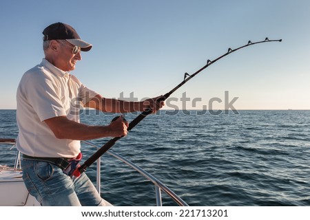 fisherman fishing from the boat