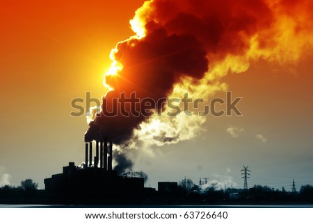 Power plant with smoke and dirty orange air