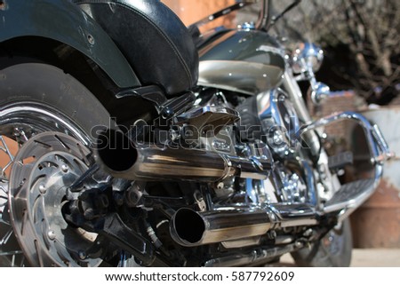 Subotica, Serbia-February 25,2017:Green Yamaha DragStar 1100 motorcycle in front of the garage, photographed on a nice sunny day. Ready for restoration. Lot of chrome detail.