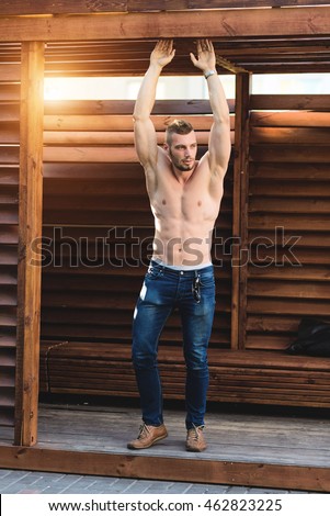 Portrait in full-length white athletic men.Toning