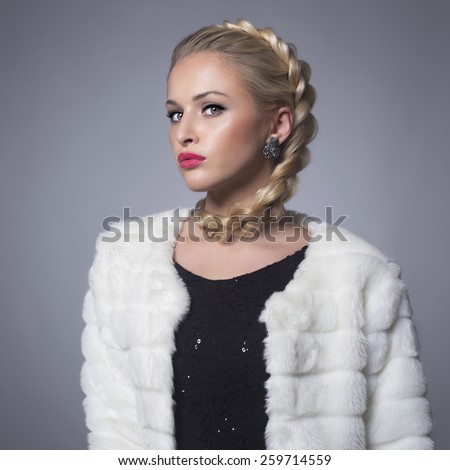 https://thumb7.shutterstock.com/display_pic_with_logo/2978116/259714559/stock-photo-beautiful-blond-woman-in-fur-winter-fashion-beauty-blond-model-girl-in-rabbit-fur-coat-woman-in-259714559.jpg
