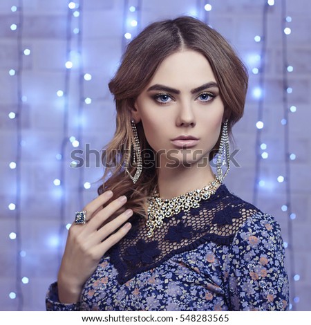 https://thumb7.shutterstock.com/display_pic_with_logo/2978116/548283565/stock-photo-beautiful-young-woman-in-interior-elegant-fashion-glamour-girl-in-christmas-decorated-interior-548283565.jpg