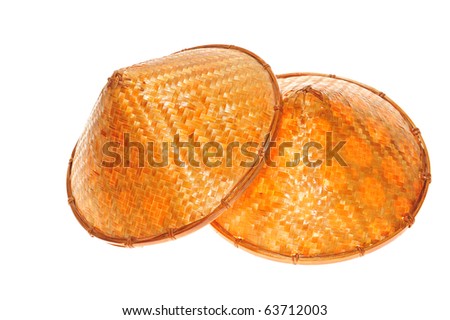 Two Conical Straw Hats on white background