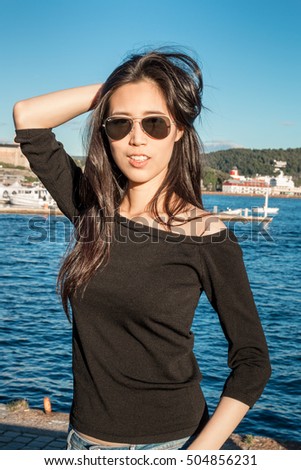 https://thumb7.shutterstock.com/display_pic_with_logo/3023354/504856231/stock-photo-beautiful-asian-girl-in-black-happy-asian-girl-beautiful-young-asian-woman-travel-in-europe-504856231.jpg